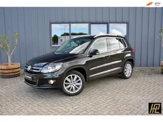 Volkswagen Tiguan 1.4 TSI 160pk Sport&Style * 18" New York * Zwenktrekhaak * Navi * Stoelverwarming 