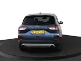 Foto 27 van Ford Kuga 2.5 PHEV Titanium X | Trekhaak | Stoelverwarming | Navigatie | Camera voor + Achter |