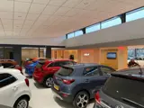 Foto 25 van Kia e-Niro Edition 64 kWh - Trekhaak - Stoel-/stuurverwarming - Keyless - Apple CarPlay/Android Auto