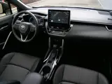 Foto 21 van Toyota Corolla Cross 1.8 High Power Hybrid Style 140 Pk Automaat Navigatie / DAB / Leer / Pano-dak /