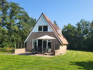 Comfortabel ruim vakantiehuis met grote tuin aan de rand van De Koog