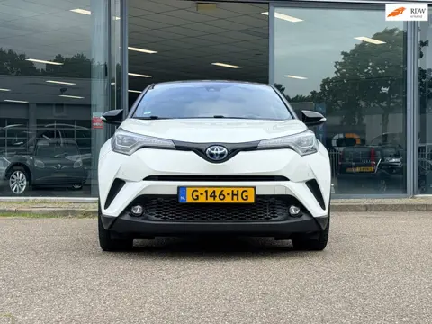 Toyota C-HR 1.8 Hybrid Bi-Tone Plus, Leer, Dodehoek Sensoren, Stoelverwarming, Navi