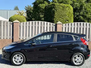 Foto 18 van Ford Fiesta 1.0 EcoBoost Titanium NAVI CLIMATE CONTROL P-SENSOREN TREKHAAK SPOILER