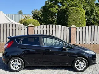 Foto 12 van Ford Fiesta 1.0 EcoBoost Titanium NAVI CLIMATE CONTROL P-SENSOREN TREKHAAK SPOILER