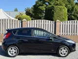 Foto 22 van Ford Fiesta 1.0 EcoBoost Titanium NAVI CLIMATE CONTROL P-SENSOREN TREKHAAK SPOILER