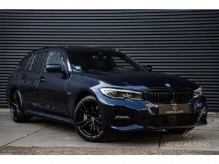 Foto 11 van BMW 3-serie Touring 330e xDrive M-Pakket 292PK|Pano|360°|HUD|Rijmodus|Tr.Haak|Sfeer|Keyless|Laser|Di