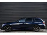 Foto 22 van BMW 3-serie Touring 330e xDrive M-Pakket 292PK|Pano|360°|HUD|Rijmodus|Tr.Haak|Sfeer|Keyless|Laser|Di