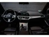 Foto 25 van BMW 3-serie Touring 330e xDrive M-Pakket 292PK|Pano|360°|HUD|Rijmodus|Tr.Haak|Sfeer|Keyless|Laser|Di