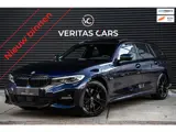 Foto 29 van BMW 3-serie Touring 330e xDrive M-Pakket 292PK|Pano|360°|HUD|Rijmodus|Tr.Haak|Sfeer|Keyless|Laser|Di