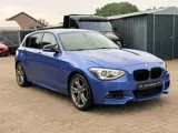 Foto 26 van BMW 1-serie 116i Executive M Sport|Nieuwe Ketting + Klepseals|Navigatie|Keyless|Cruise control|Clima
