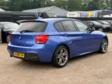 Foto 28 van BMW 1-serie 116i Executive M Sport|Nieuwe Ketting + Klepseals|Navigatie|Keyless|Cruise control|Clima