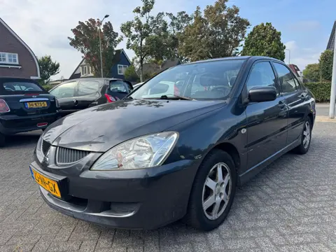 Mitsubishi Lancer 1.6 Comfort 98pk,Apk 8/7/27,Airco,Elek-pakket,Trekhaak