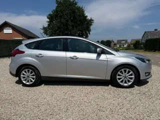 Foto 16 van Ford Focus 1.0 Titanium Edition Stoel VW. | Navi | PDC | LM | Cruise | Keyless | Org. NL