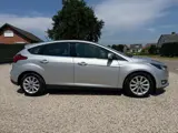 Foto 26 van Ford Focus 1.0 Titanium Edition Stoel VW. | Navi | PDC | LM | Cruise | Keyless | Org. NL