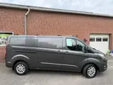 Foto 24 van Ford Transit Custom 300 2.0 TDCI L3H2 Limited Automaat , Camera, Cruise control, omvormer, 3 zits