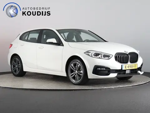 BMW 1-serie 118i Executive Edition (NL-Auto / Afn. trekhaak / Digitaal dashboard / Carplay / Cruise)