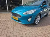 Foto 30 van Ford Fiesta 1.0 EcoBoost Titanium 100PK *Camera*Carplay*Adaptive cruise* voorruit verwarming * Rijkl