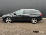 Foto 30 van Opel Astra Sports Tourer 1.4 Turbo S/S|125PK|CAMERA|112DKM|GOED ONDERHOUDEN