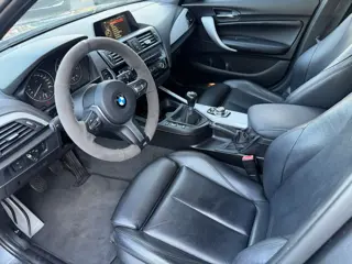 Foto 16 van BMW 1-serie 116i M Sport||M140i Look| Sportuitlaat|Pdc|