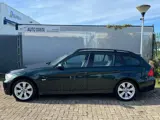 Foto 25 van BMW 3-serie Touring 318i - Airco-Cruise-PDC- APK 03-27