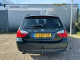 Foto 27 van BMW 3-serie Touring 318i - Airco-Cruise-PDC- APK 03-27