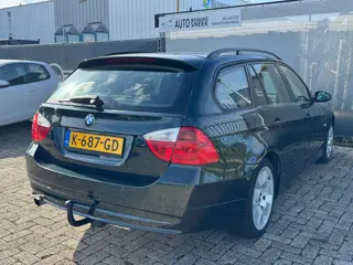 Foto 18 van BMW 3-serie Touring 318i - Airco-Cruise-PDC- APK 03-27