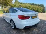 Foto 30 van BMW 3-serie Gran Turismo 320i Executive_PANORAMADAK_NETTE AUTO