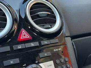 Foto 18 van Opel Corsa 1.4-16V Cosmo*Nieuwe-APK*CruiseControl*Parksensorachter*5Deurs*