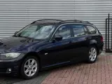 Foto 22 van BMW 3-serie Touring 320i Business Line AIRCO|LEER|NAVI