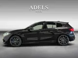 Foto 26 van BMW 1-serie M135i xDrive High Executive Panodak Leder HUD Harman Kardon Camera Carplay Dealer Onderh