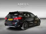 Foto 24 van BMW 1-serie M135i xDrive High Executive Panodak Leder HUD Harman Kardon Camera Carplay Dealer Onderh