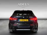 Foto 23 van BMW 1-serie M135i xDrive High Executive Panodak Leder HUD Harman Kardon Camera Carplay Dealer Onderh