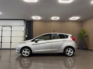 Foto 11 van Ford Fiesta 1.25 Titanium * 77.763 km + NAP / Airco / LM Velgen / NL Auto *