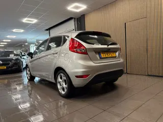 Foto 20 van Ford Fiesta 1.25 Titanium * 77.763 km + NAP / Airco / LM Velgen / NL Auto *