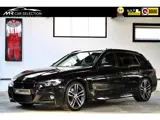 Foto 30 van BMW 3-serie Touring 318i High Executive M Sport | 19" | HUD | Panoramadak | Trekhaak | NL Geleverd