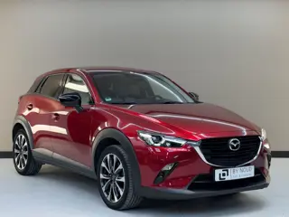 Foto 16 van Mazda CX-3 2.0 SkyActiv-G 121 Comfort, 122Pk, 2021, Dealer onderhouden, Trekhaak, Stoelverwarming, C