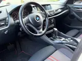 Foto 24 van BMW X1 SDrive18i AUTOMAAT NAVI/CRUISE/ISOFIX | NETTE AUTO !