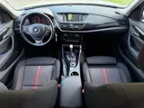 Foto 23 van BMW X1 SDrive18i AUTOMAAT NAVI/CRUISE/ISOFIX | NETTE AUTO !