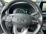 Foto 11 van HYUNDAI KONA EV FASHION 64 KWH, 3-fase, Camera, Warmtepomp, Carplay, Navi, Keyless, ALL IN prijs!