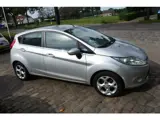 Foto 28 van Ford Fiesta 1.25 Titanium 5 drs nw apk 22-10-2027 airco voorruit verwarming