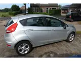 Foto 27 van Ford Fiesta 1.25 Titanium 5 drs nw apk 22-10-2027 airco voorruit verwarming