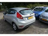 Foto 26 van Ford Fiesta 1.25 Titanium 5 drs nw apk 22-10-2027 airco voorruit verwarming