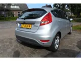Foto 25 van Ford Fiesta 1.25 Titanium 5 drs nw apk 22-10-2027 airco voorruit verwarming