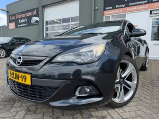 Opel Astra GTC 1.6 Turbo Sport met leer en parkeersensoren en navigatie en bluetooth en cruise contr