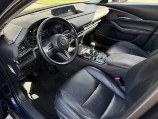 Foto 14 van Mazda CX-30 2.0 e-SkyActiv-X M Hybrid Comfort / Keyless / Trekhaak / 18"LM / Carplay / Navi / PDC +