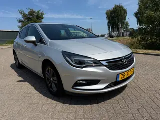 Foto 17 van Opel Astra 1.4 Turbo 120 Jaar Edition_AUTOMAAT_AIRCO_NETTE AUTO