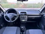 Foto 26 van Opel Corsa 1.2i-16V Onyx