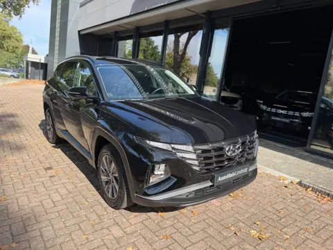Hyundai Tucson 1.6 T-GDI HEV Comfort Smart|Camera|Nav|CarPlay|Nieuwstaat|Dealer Onderhouden