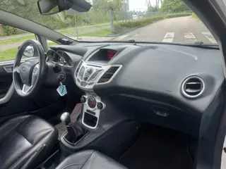 Foto 14 van Ford Fiesta 1.25 Titanium Leer Climate 1e eigen. (bj 2012)