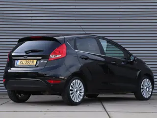 Foto 20 van Ford Fiesta 1.25 Titanium *Klimaatreg.*Parkeersens.*